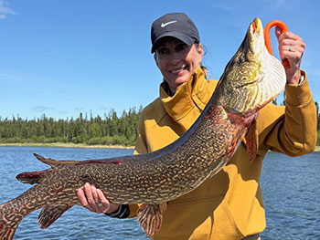 Woman holding large fish 9